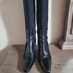 Black Prade knee high boot.